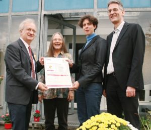 Wolfgang Feist and Witta Ebel recieve their Passive House Plus certificate