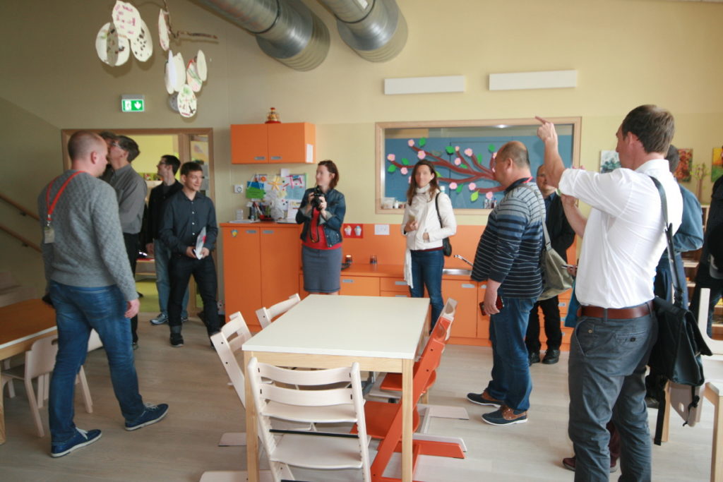 Visitor looking at a classroom in a Passive House Kindergarten
