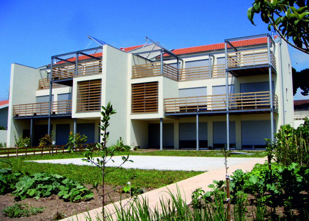 passive house apartment building in portugal, taken on a clear sunny day
