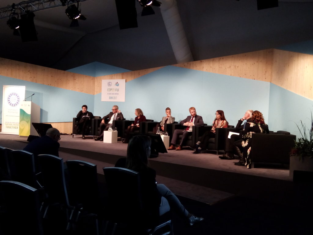 view from audience during podium discussion at COP23