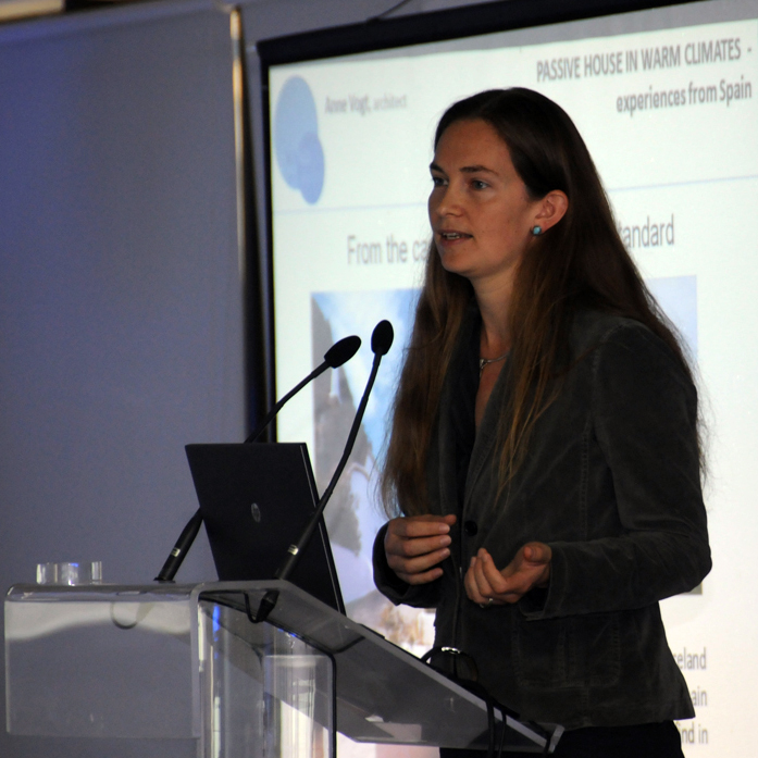 Image of Anne Vogt presenting on the Passive House Standard.